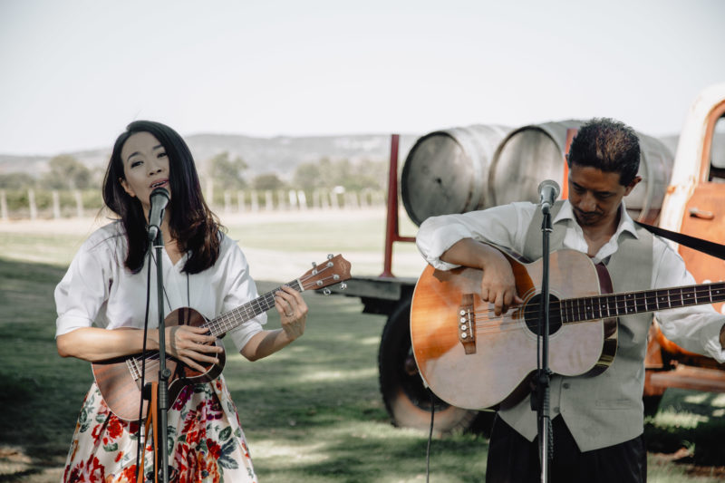 Polkadot + Moonbeam plays near the Chevy truck at the rustic Oakover Grounds for Swan Valley Twilight Wedding Expo - Photo: Simona Sergi Photography